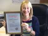Debbie going through all reply cards that have been returned to us from the guilds
