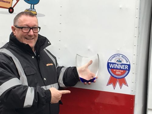 Click Here To Enlarge This Photo Of Mover Of The Year Award